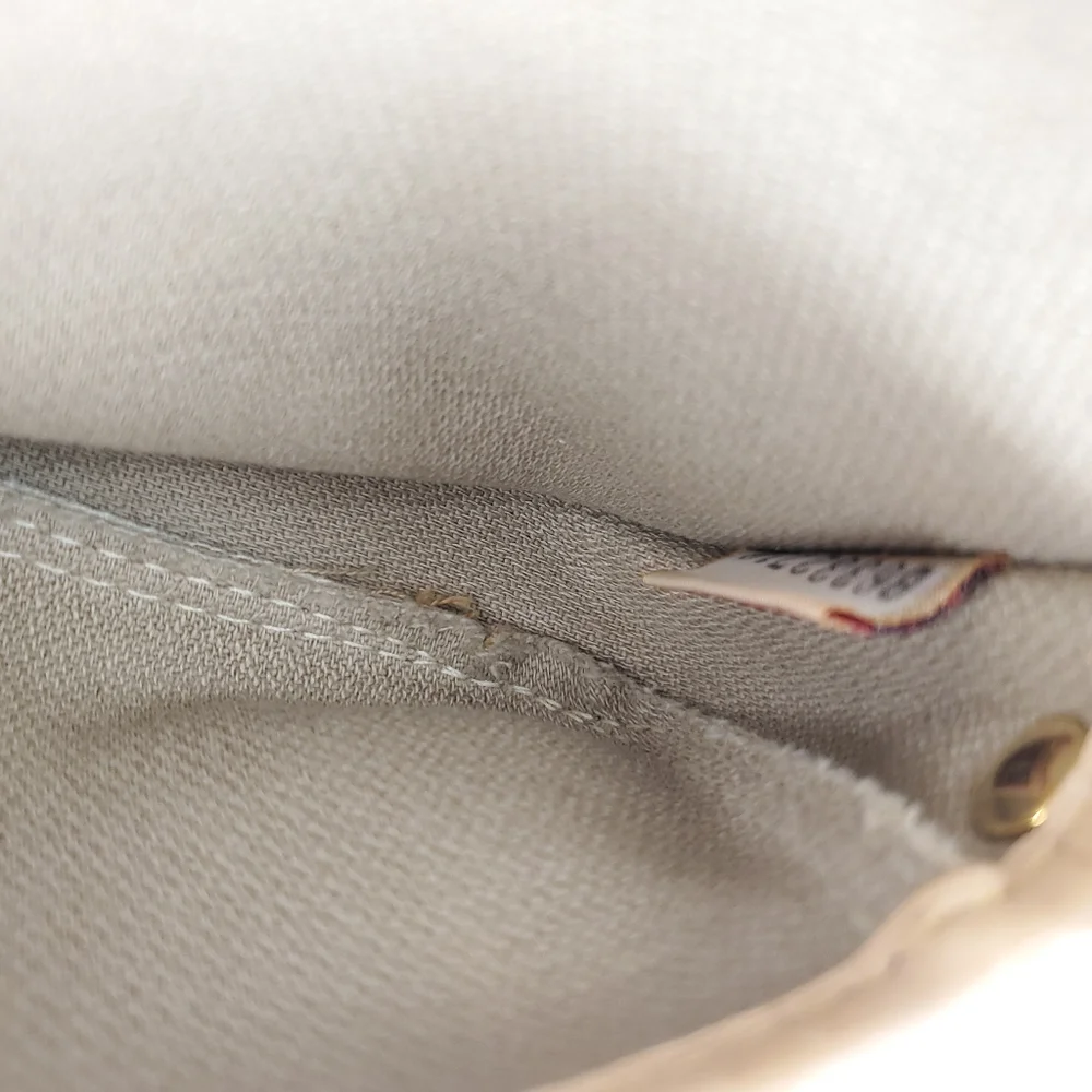 Dooney & Bourke Cream Canvas Pouch